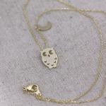 Tiny owl with crescent moon necklac..